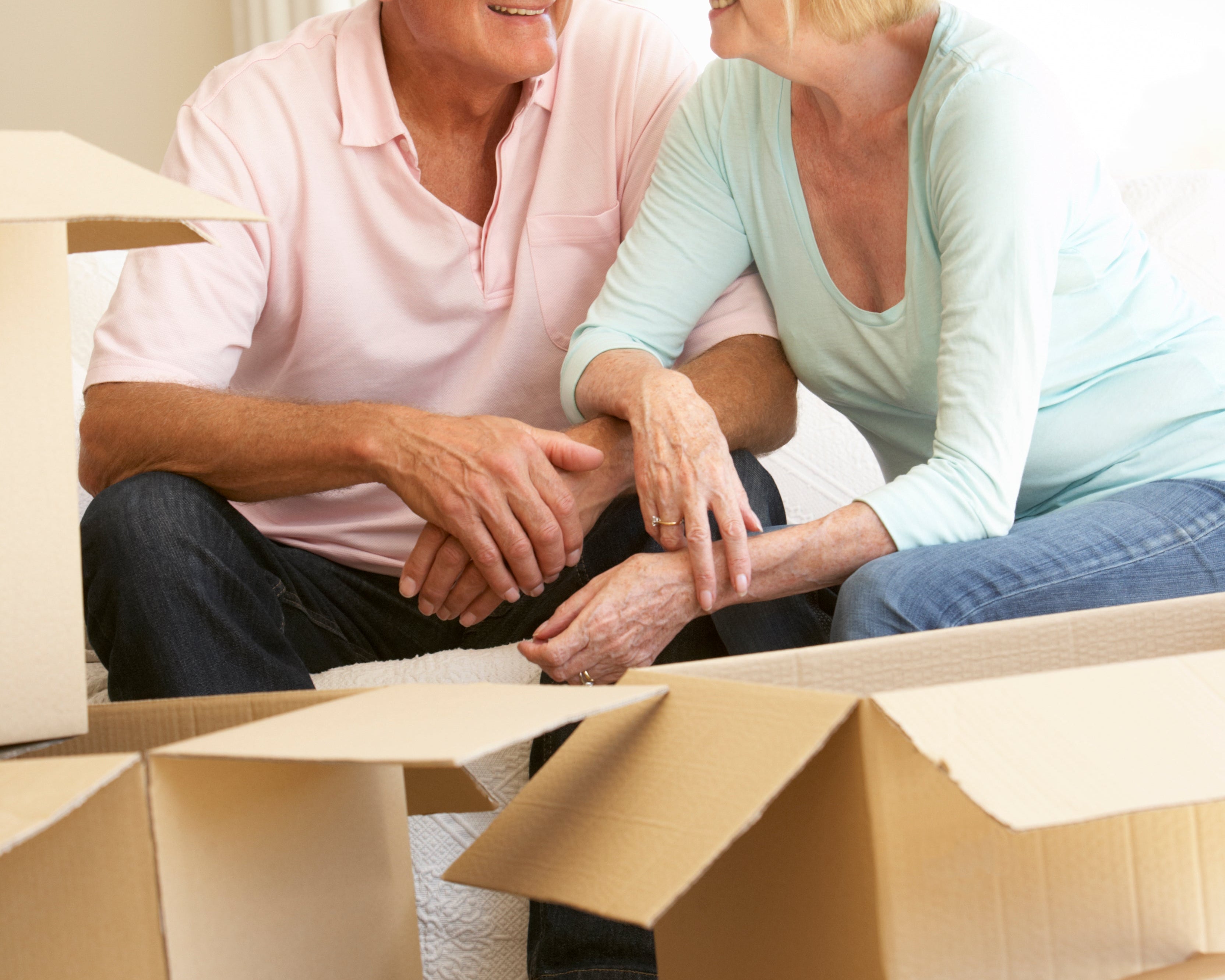seniors packing and moving boxes, elderly safety in the home