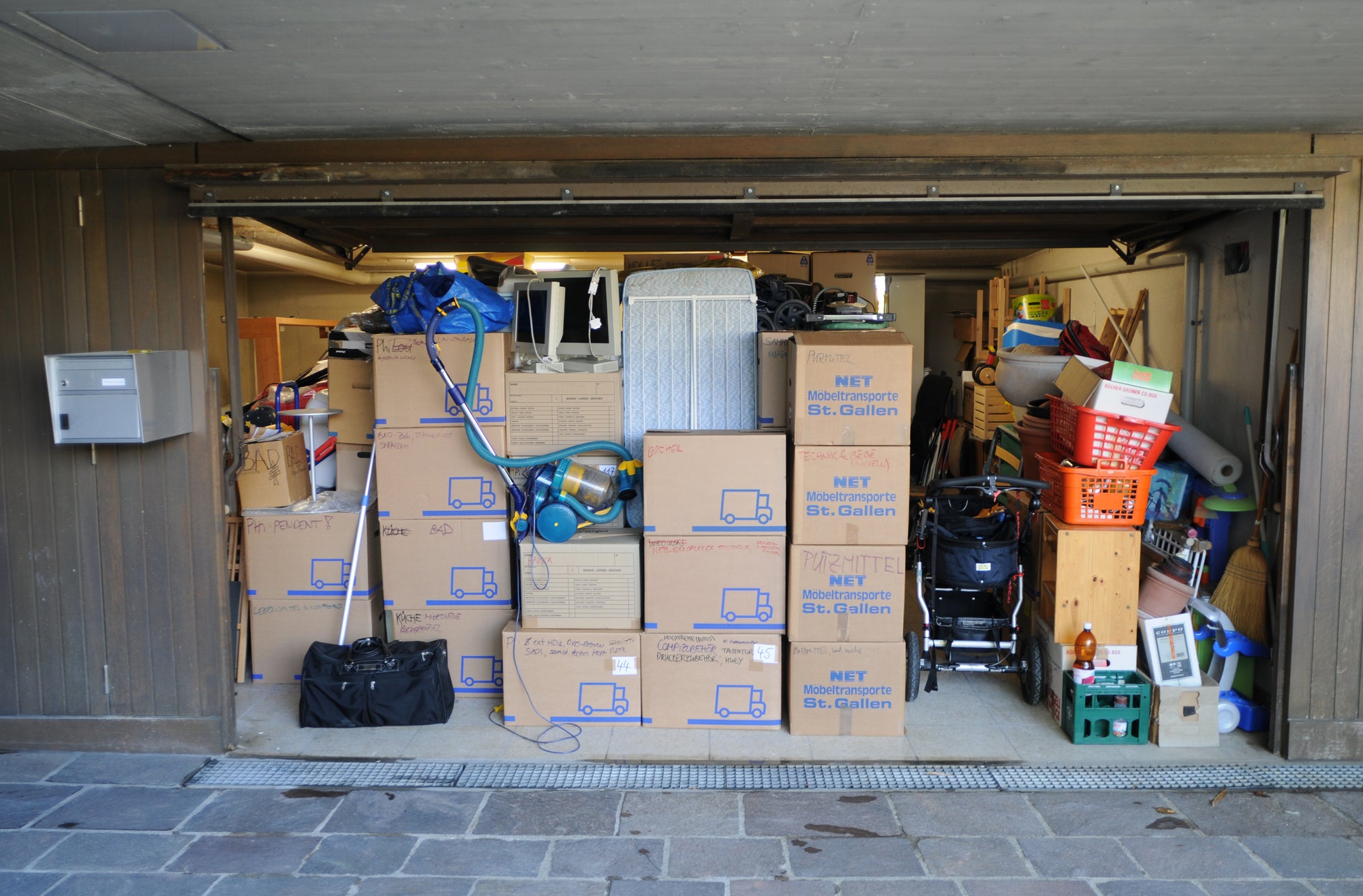 packed full garage, hoarders garage