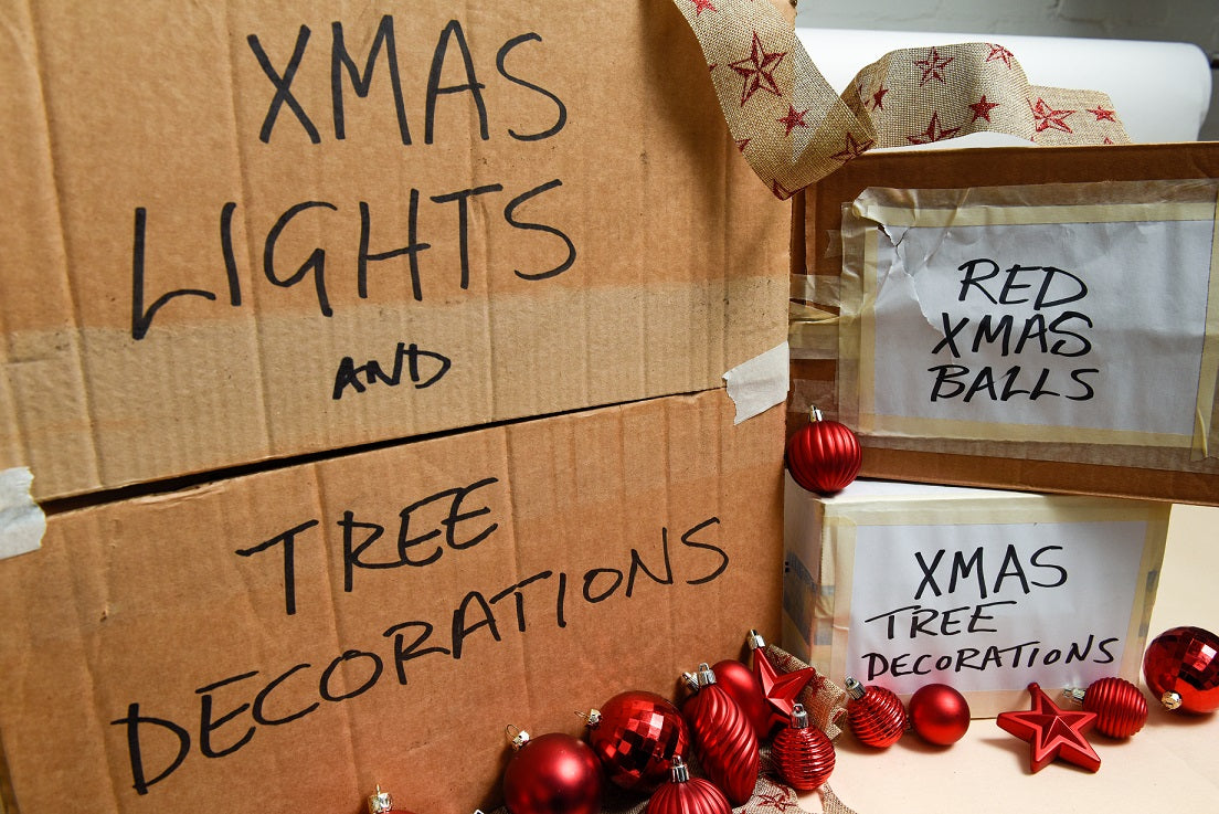 labeled boxes with Christmas decorations